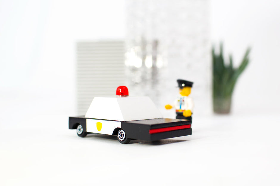 Houten politieauto, Candycar, in gebruik