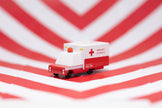 Houten ambulancebusje, Candycar, in gebruik