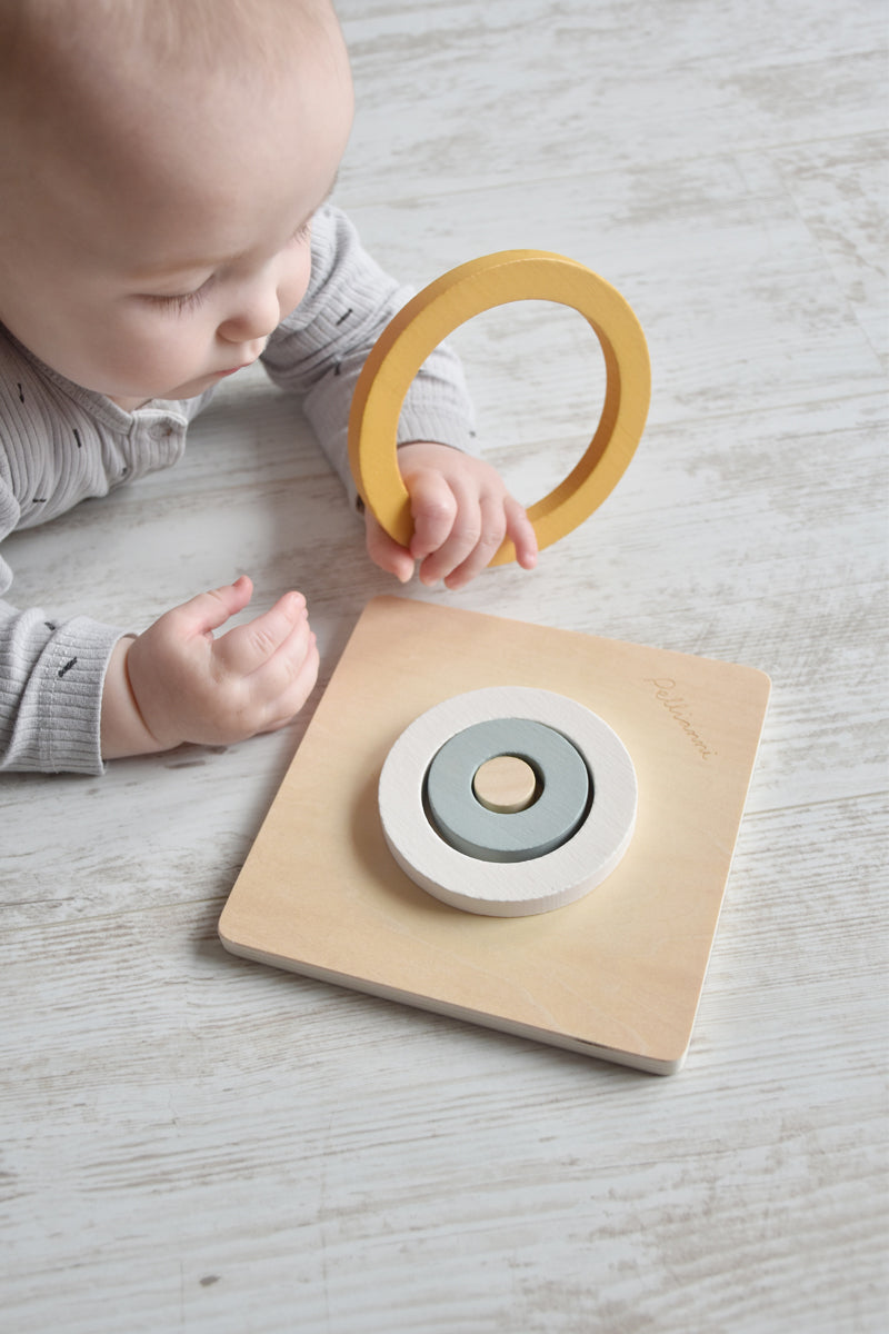 Houten eerste puzzel, Pellianni, in gebruik