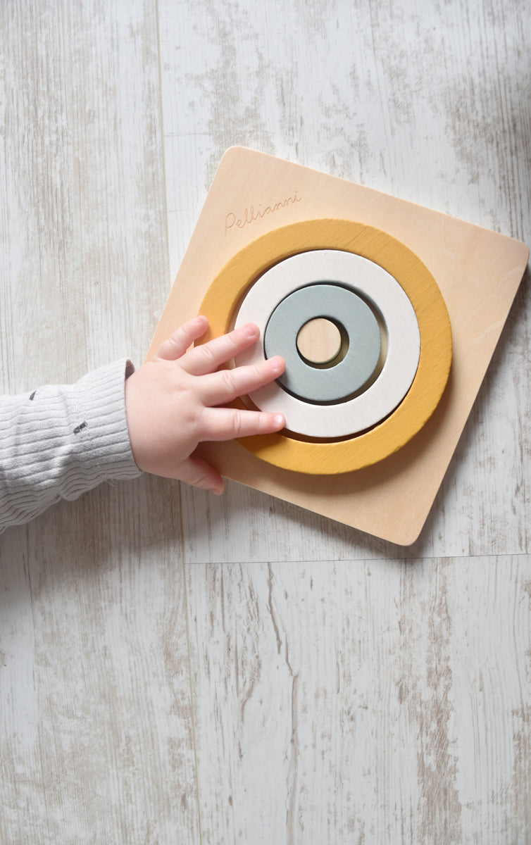 Houten eerste puzzel, Pellianni, in gebruik